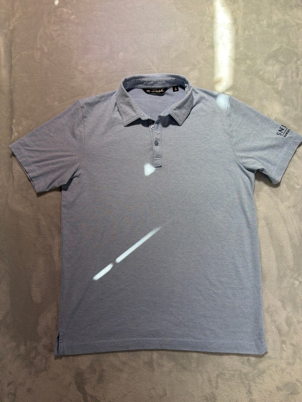 TravisMathew Men's Heathered Light Blue Pima Cotton Golf Polo Shirt
